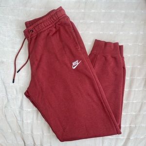 Coral/Orange color Nike sweats